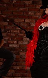 Man and woman in cabaret outfits